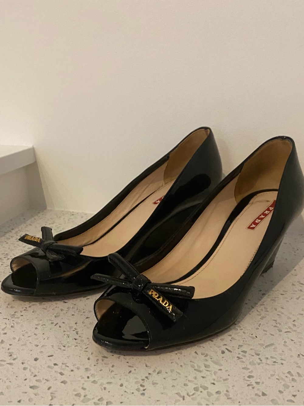 Vintage Prada Black Peep-Toe Bow Wedges, with gold accents
